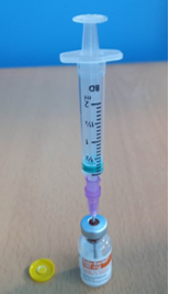 Syringe and Solu-Cortef vial