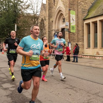 a man running Cambridge Half marathon