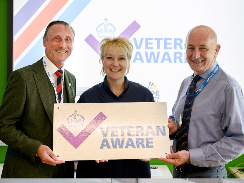 David Wood, Lorraine Szeremeta and Mike More holding up Veterans' Aware logo