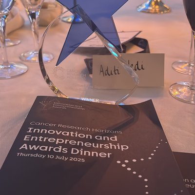 Photo of the Cancer Horizons Award made of glass displayed on a table
