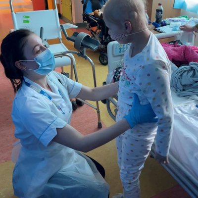 Paediatric physiotherapist Becca Knowles with patient Erin Beales