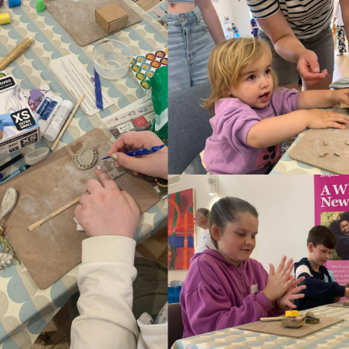 Children smiling and doing an arts clay activity