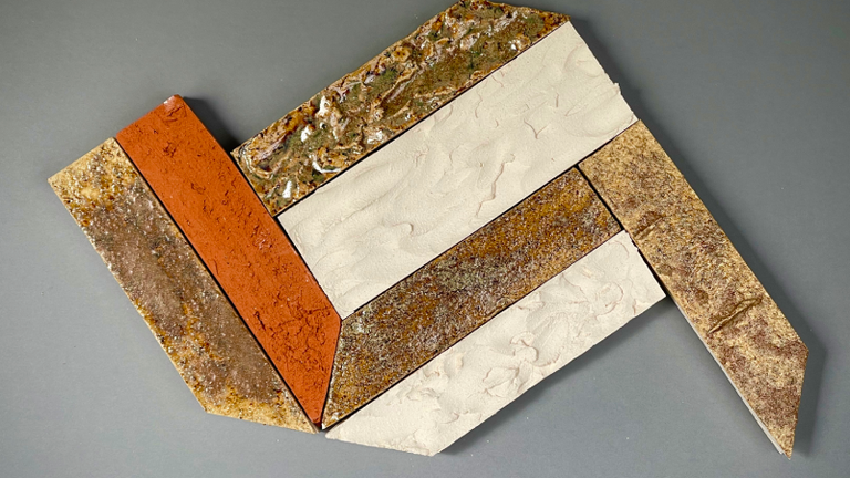 Different coloured tiles lined up together.