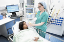 CUH anaesthetist Louisa Swain administers anaesthetic gas to a patient