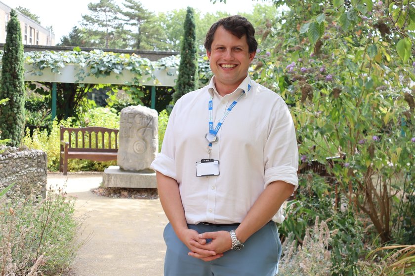 A photo of a man in a garden