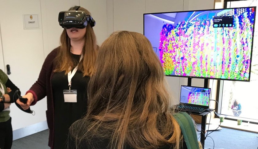 A woman wearing a virtual reality headset
