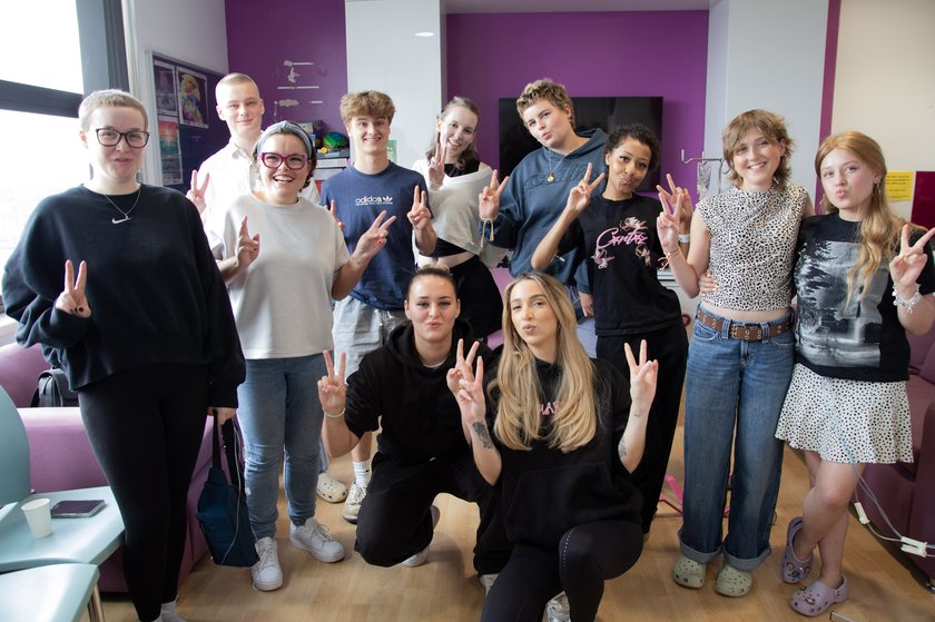 GK Barry, Ella Rutherford and young patients on the Teenage Cancer Trust Unit