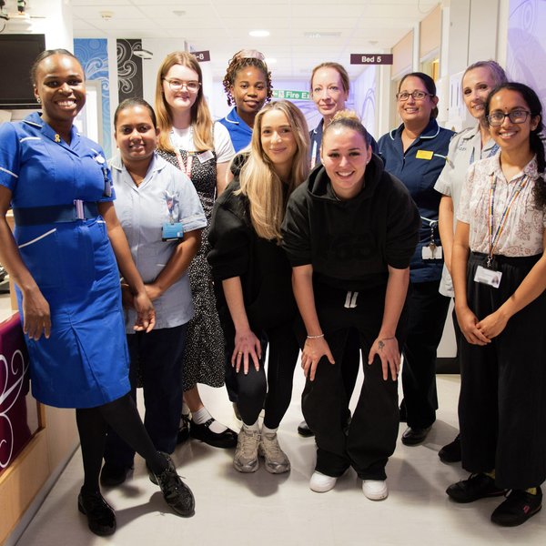 GK Barry and Ella Rutherford with CUH staff on ward C9