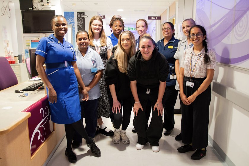 GK Barry and Ella Rutherford with CUH staff on ward C9