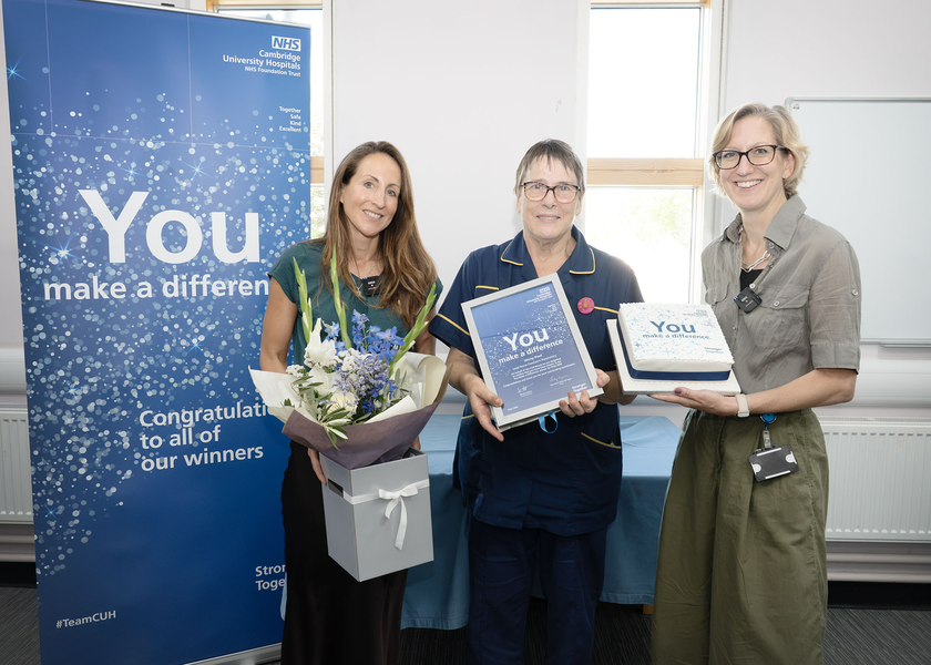 Jenny Pool recieving her You Make a Difference Cake
