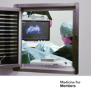 Open vent, showing through to doctor performing an ultrasound. The doctor can be seen facing the monitor, which is showing the scan.