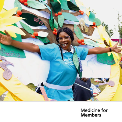 A woman taking part in a CUH Arts parade