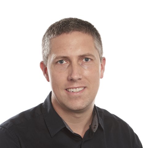 Nick Kirby profile photo - In this photo Nick has short hair and is wearing a black shirt