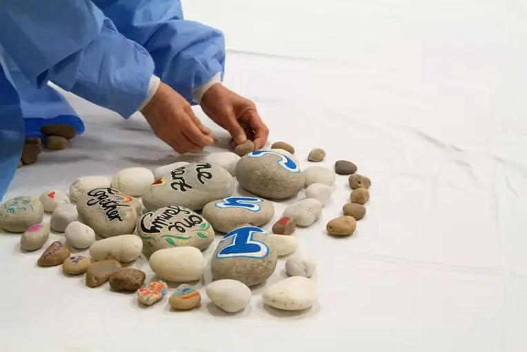The pebbles display produced by CUH Arts for CUH's Day of Reflection 2021