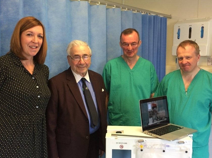 Professor Sir Roy Calne next to perfusion machine in 2018