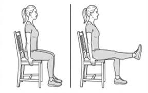 Person seated in a chair performing a knee extension exercise, lifting one leg straight out in front while keeping the other foot on the floor.