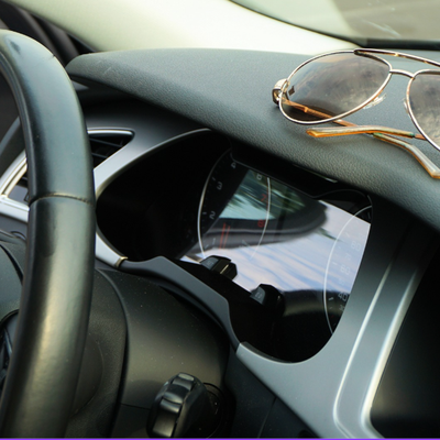 Car steering wheel in the sunshine