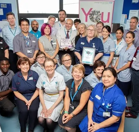 Ward C7 team with Roland Sinker holding their YMAD award