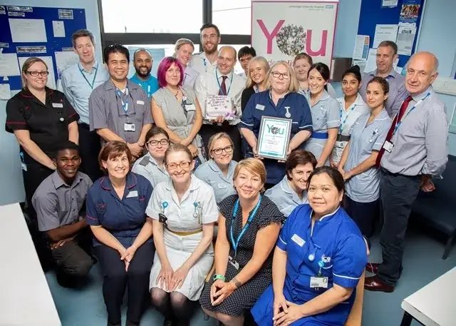 Ward C7 team with Roland Sinker holding their YMAD award
