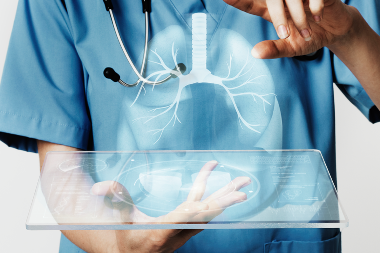 doctors using transparent tablet with hologram medical technology
