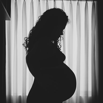 Pregnant woman with shadow