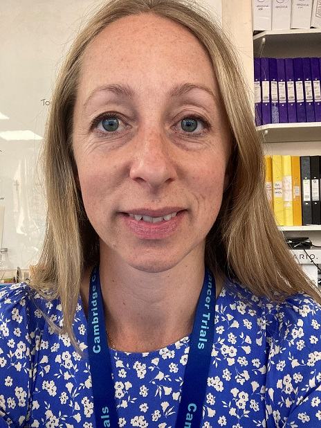 Image of a women wearing a blue floral dress