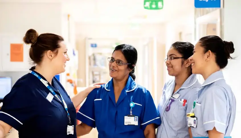 Team on ward having a conversation