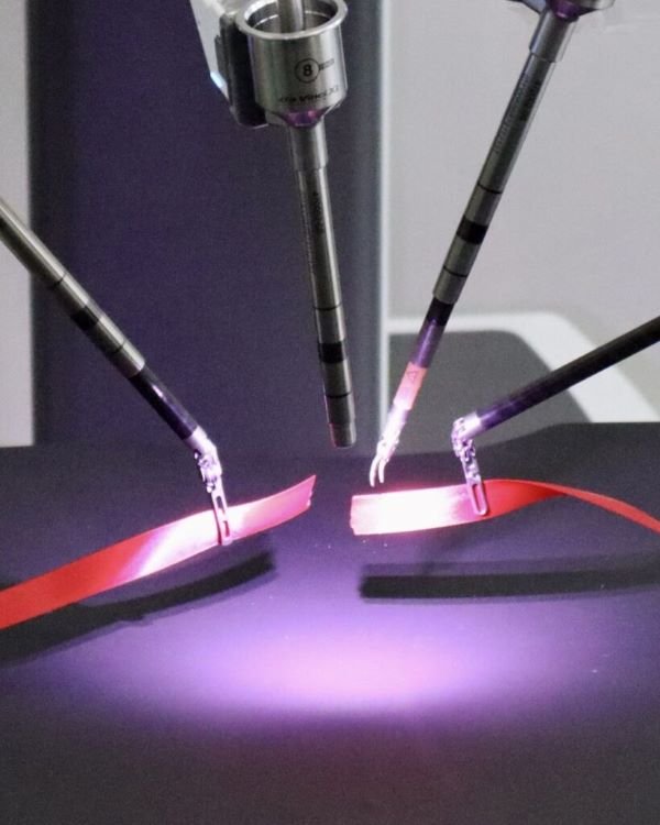 The new robot cut its own ribbon during the unveiling