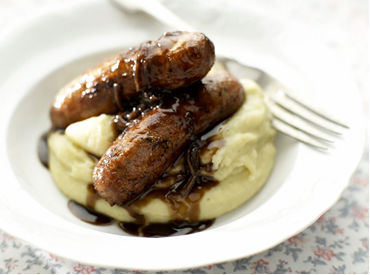 Image of sausage, mashed potato and gravy