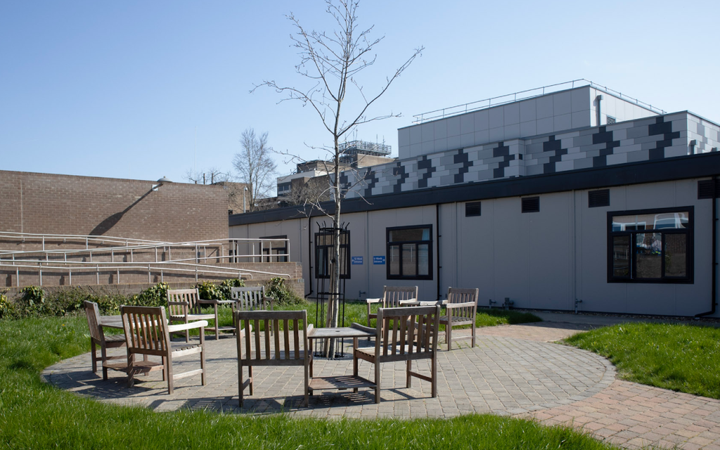 Collage of T2 ward, showing the outside garden space, corridor, artwork and main entrance.